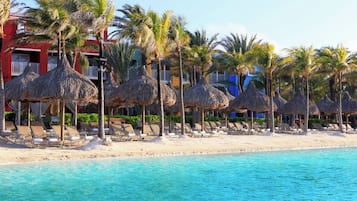 Private beach, white sand, sun loungers, beach umbrellas