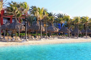 Private beach, white sand, sun loungers, beach umbrellas