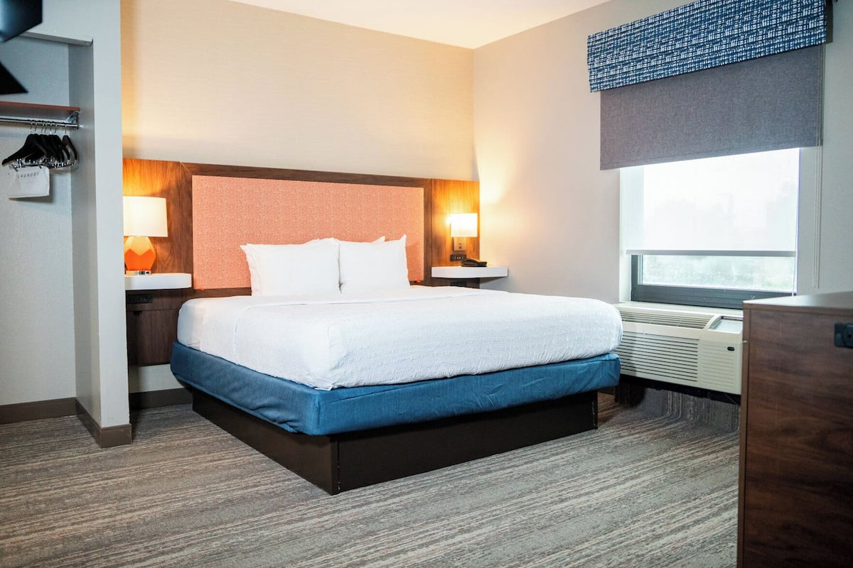 Premium bedding, down duvets, pillow-top beds, laptop workspace