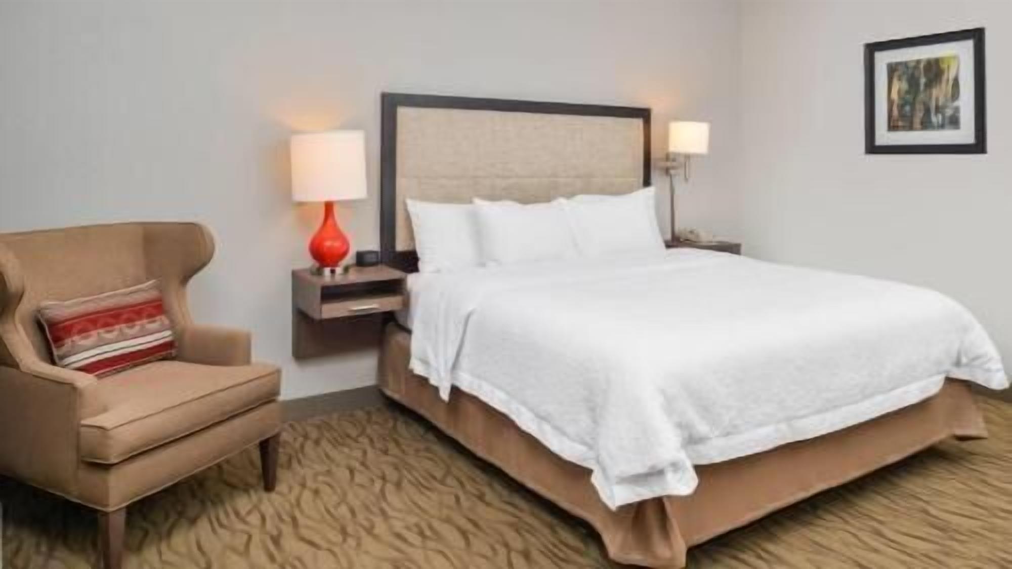 Premium bedding, down comforters, pillowtop beds, laptop workspace