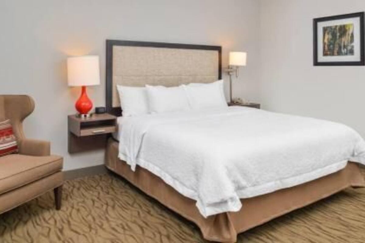 Premium bedding, down comforters, pillowtop beds, laptop workspace