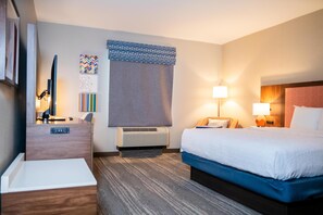 Premium bedding, down duvets, pillow-top beds, laptop workspace