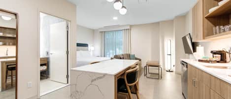 Full-sized fridge, microwave, stovetop, dishwasher