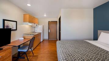 Desk, laptop workspace, blackout curtains, iron/ironing board
