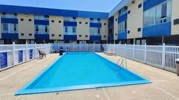 Seasonal outdoor pool, open 9 AM to 9 PM, pool loungers