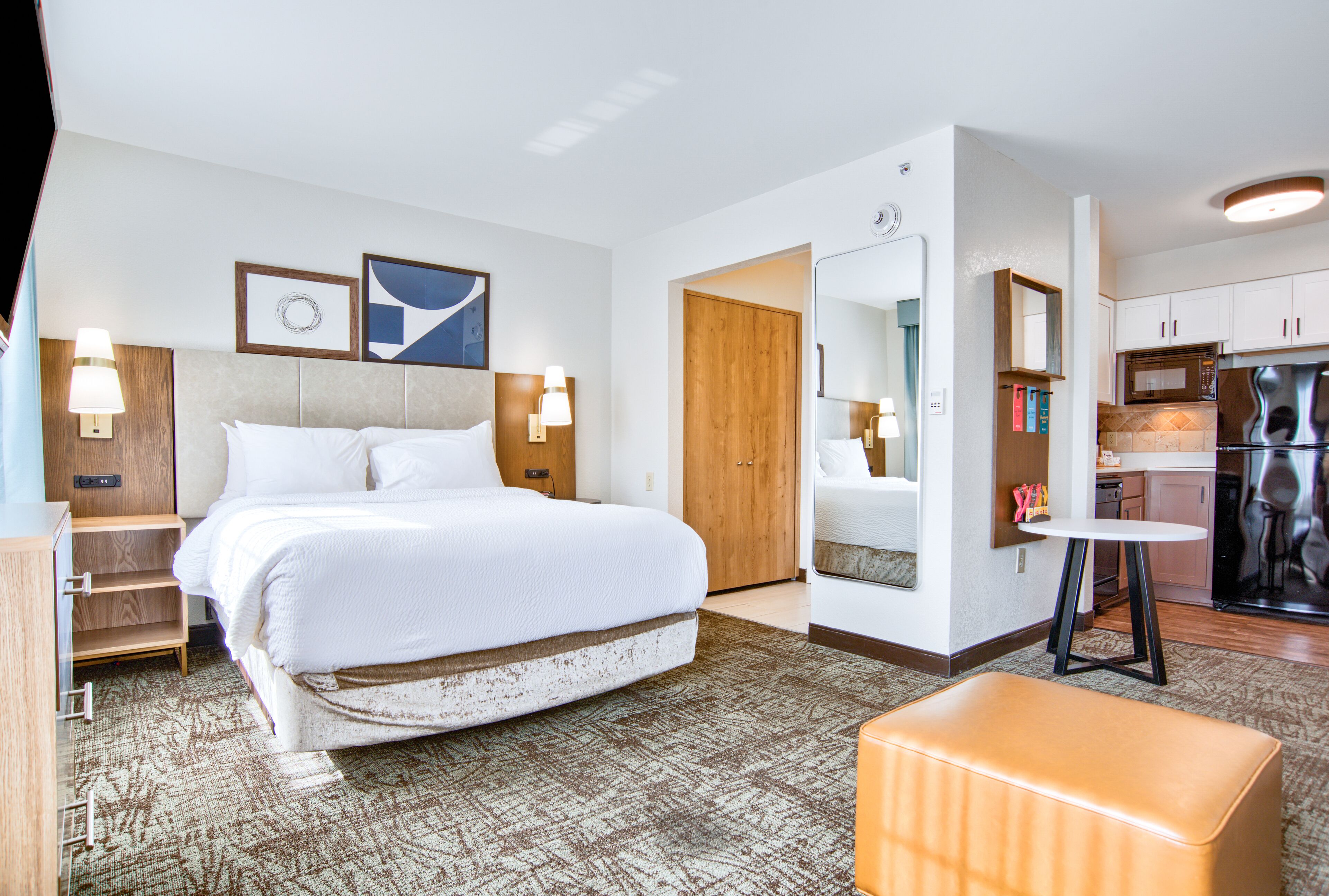 full-sized fridge, microwave, stovetop, dishwasher