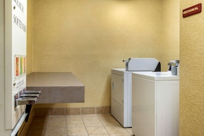 Convenient laundry facilities offer a washing machine and dryer for guest use.