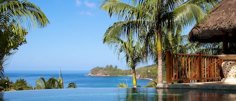 2 outdoor pools, pool umbrellas, pool loungers