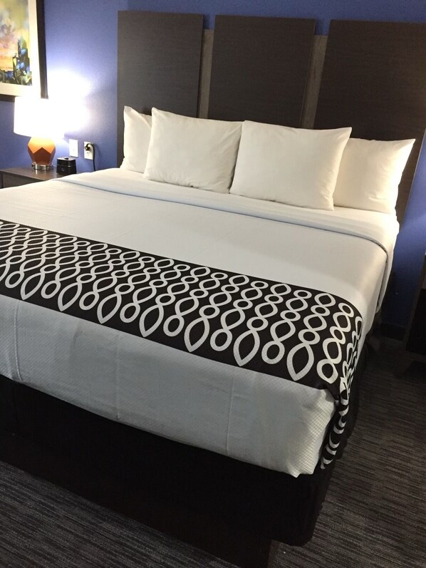 Premium bedding, down duvets, individually decorated