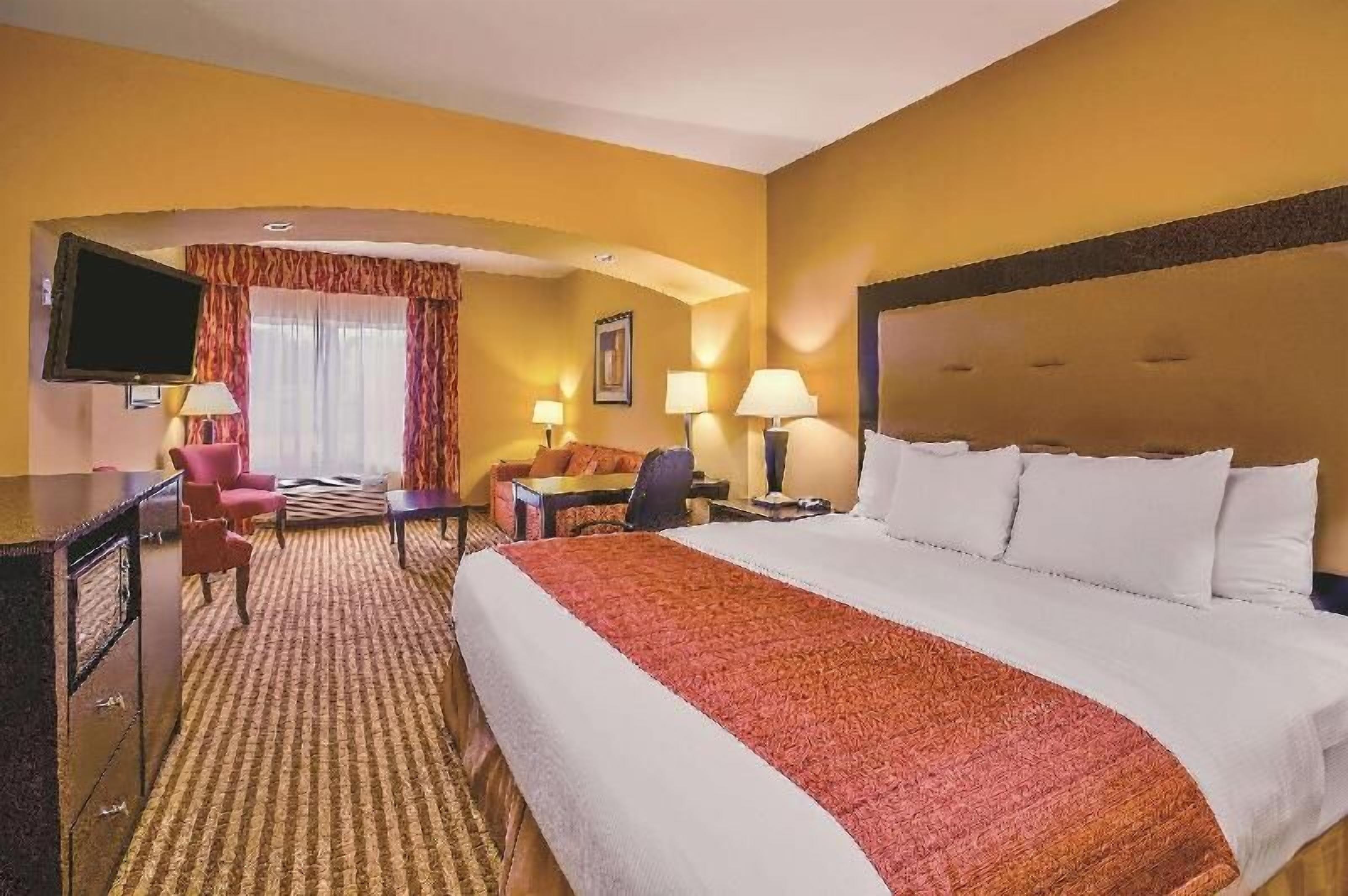 Premium bedding, down comforters, desk, blackout drapes