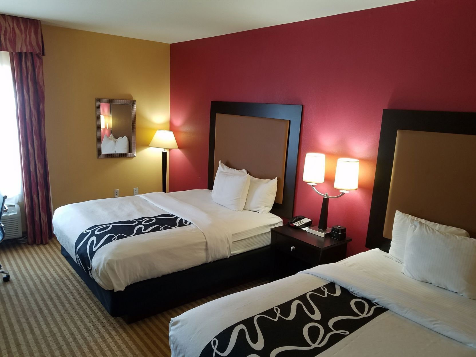 Premium bedding, down comforters, desk, blackout drapes