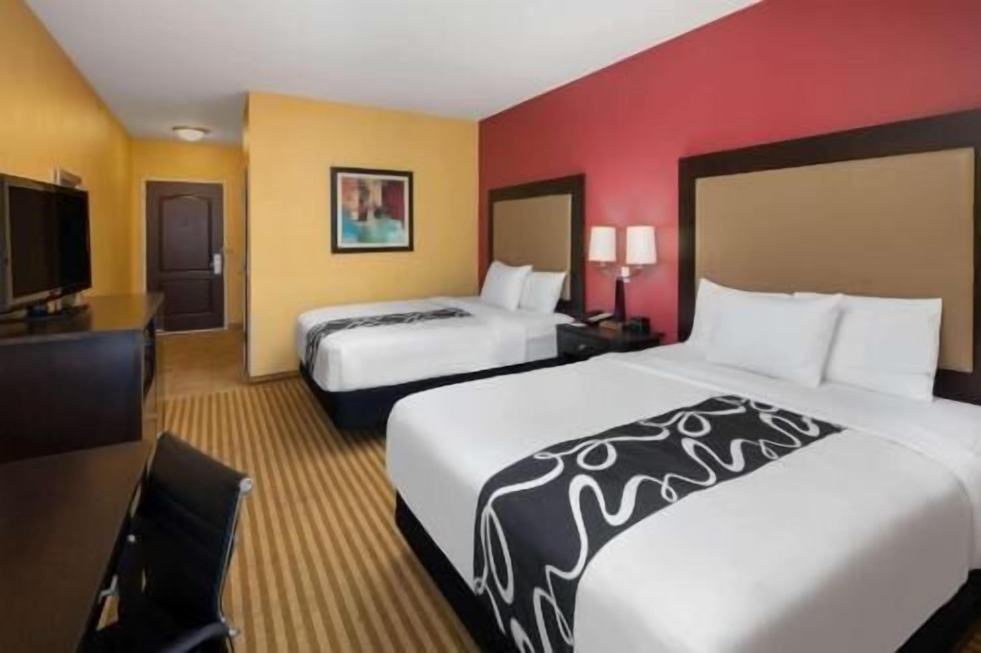 Premium bedding, down comforters, desk, blackout drapes