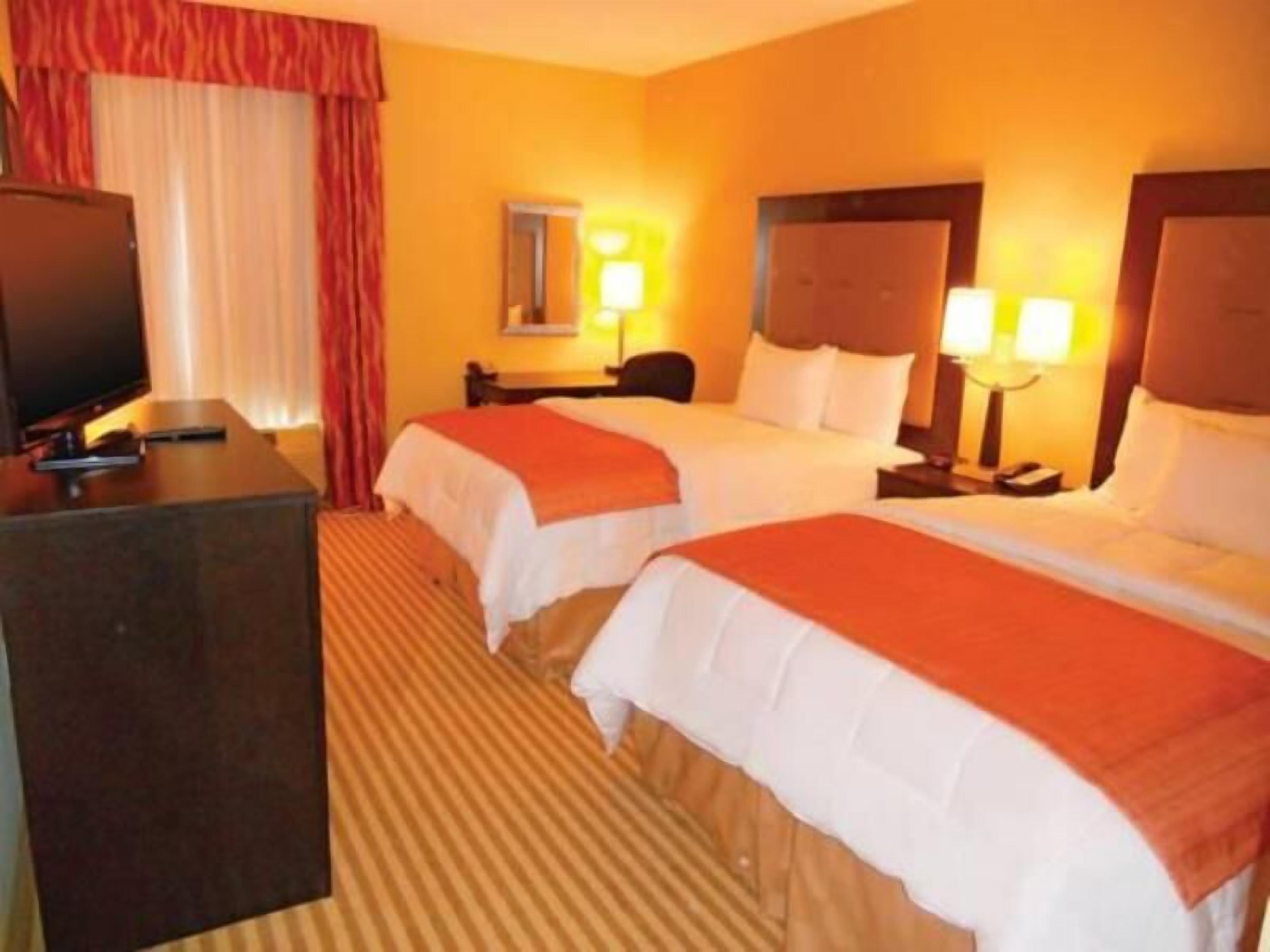 Premium bedding, down comforters, desk, blackout drapes