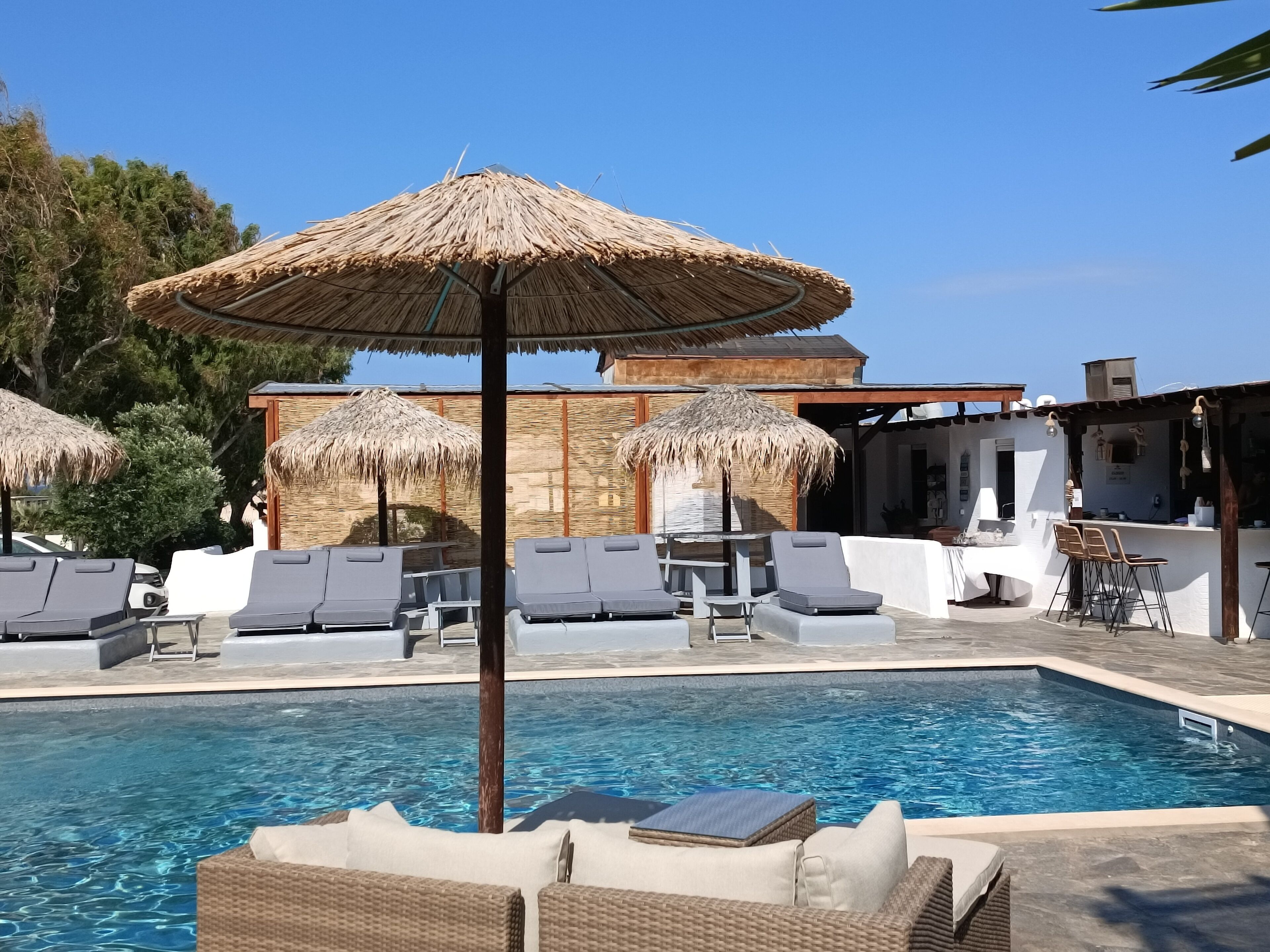 2 outdoor pools, pool umbrellas, pool loungers
