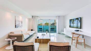Apartment, 2 Bedrooms, Waterfront | Living room | 65-inch Smart TV with digital channels, TV, streaming services