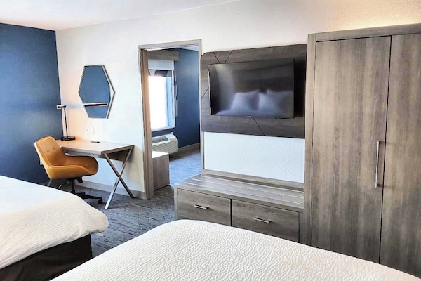 Suite, Multiple Beds | In-room safe, desk, iron/ironing board, free cribs/infant beds
