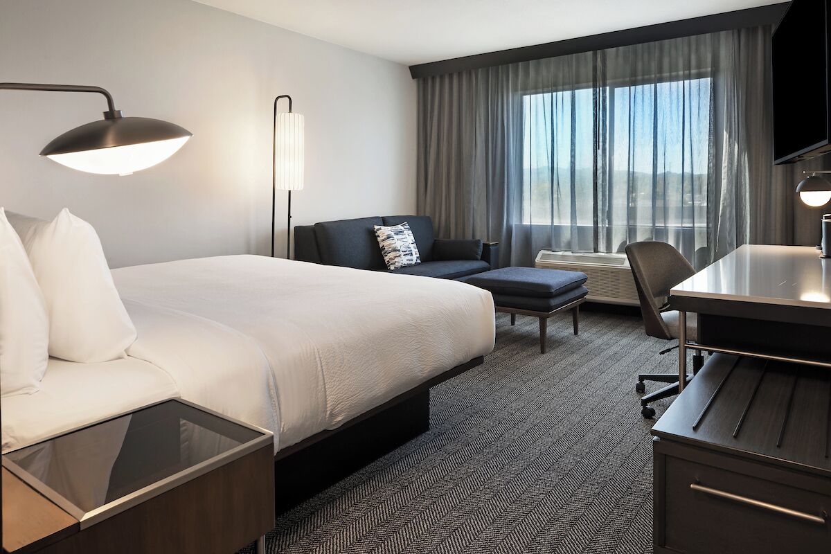 Room, 1 King Bed with Sofa bed | In-room safe, desk, blackout drapes, iron/ironing board