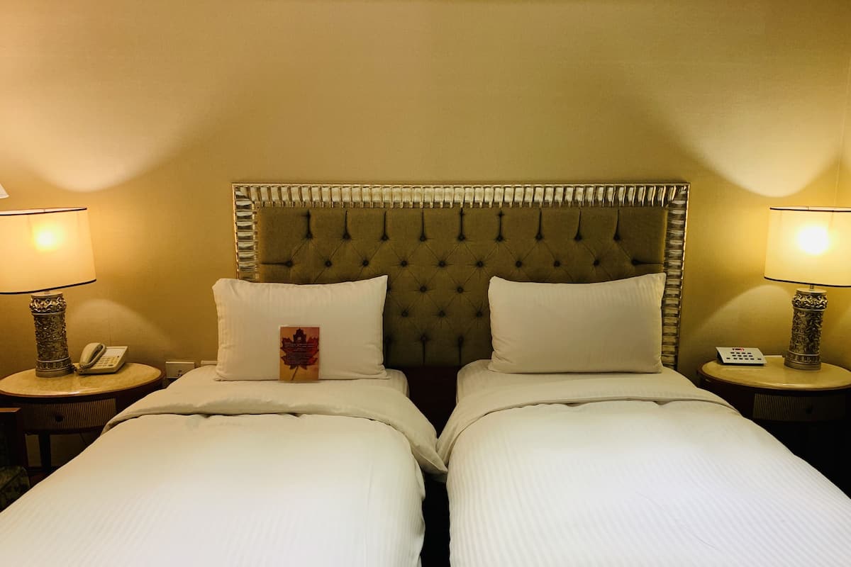 Superior Twin kamer, 2 eenpersoonsbedden | Een gratis minibar, een kluis op de kamer, een bureau