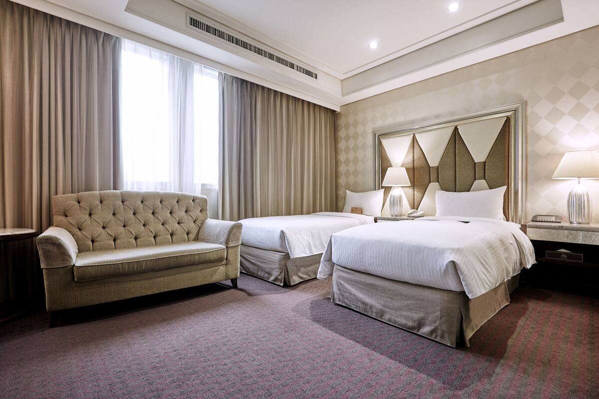 Executive Twin kamer, 2 eenpersoonsbedden | Een gratis minibar, een kluis op de kamer, een bureau