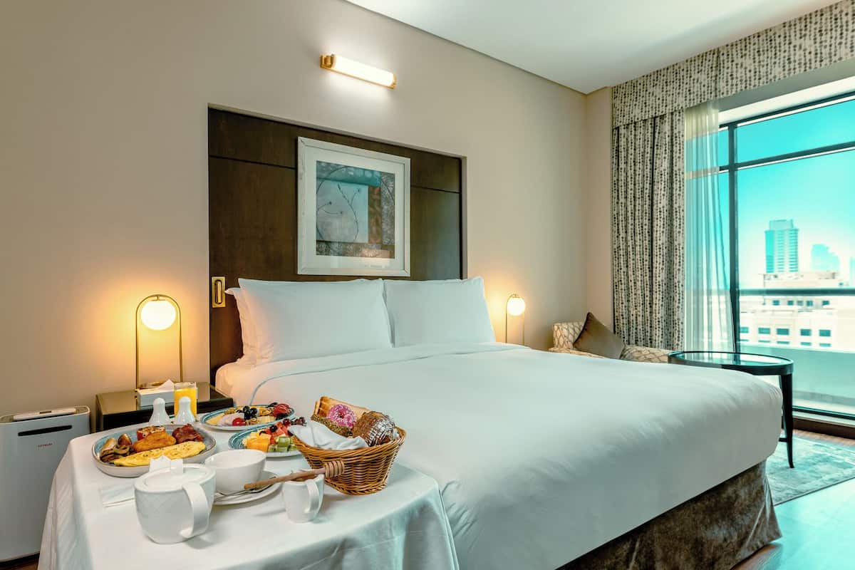 Deluxe King, Pool View | 3 bedrooms, premium bedding, in-room safe, laptop workspace