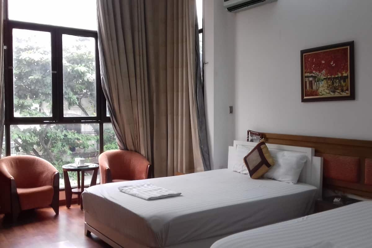 Quarto quádruplo, vista para a cidade | 1 quarto, roupas de cama premium, frigobar, cofres nos quartos