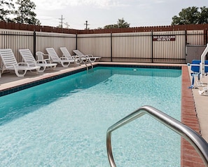 Seasonal outdoor pool, open 9:00 AM to 10:00 PM, pool loungers