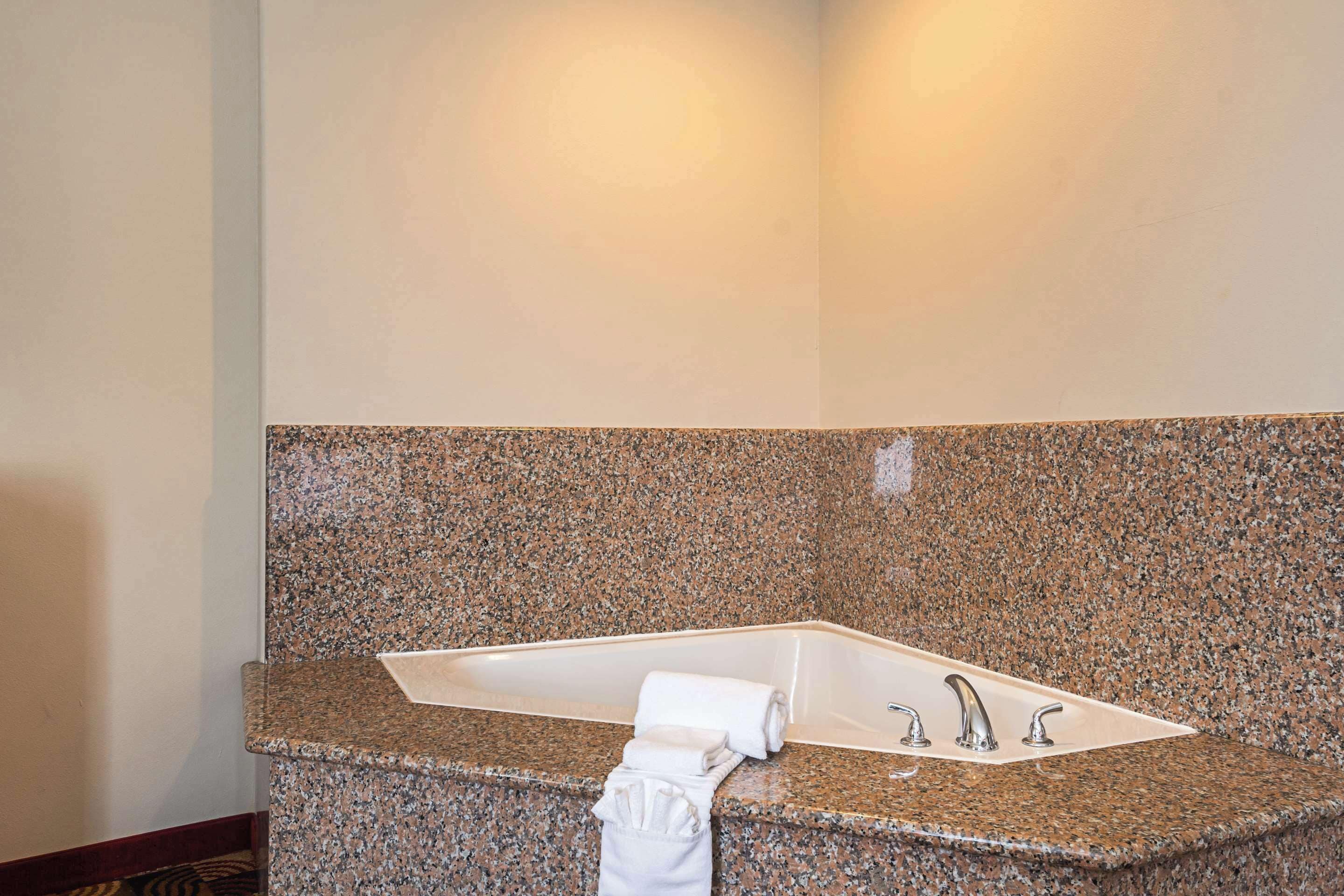 desk, laptop workspace, blackout curtains, iron/ironing board