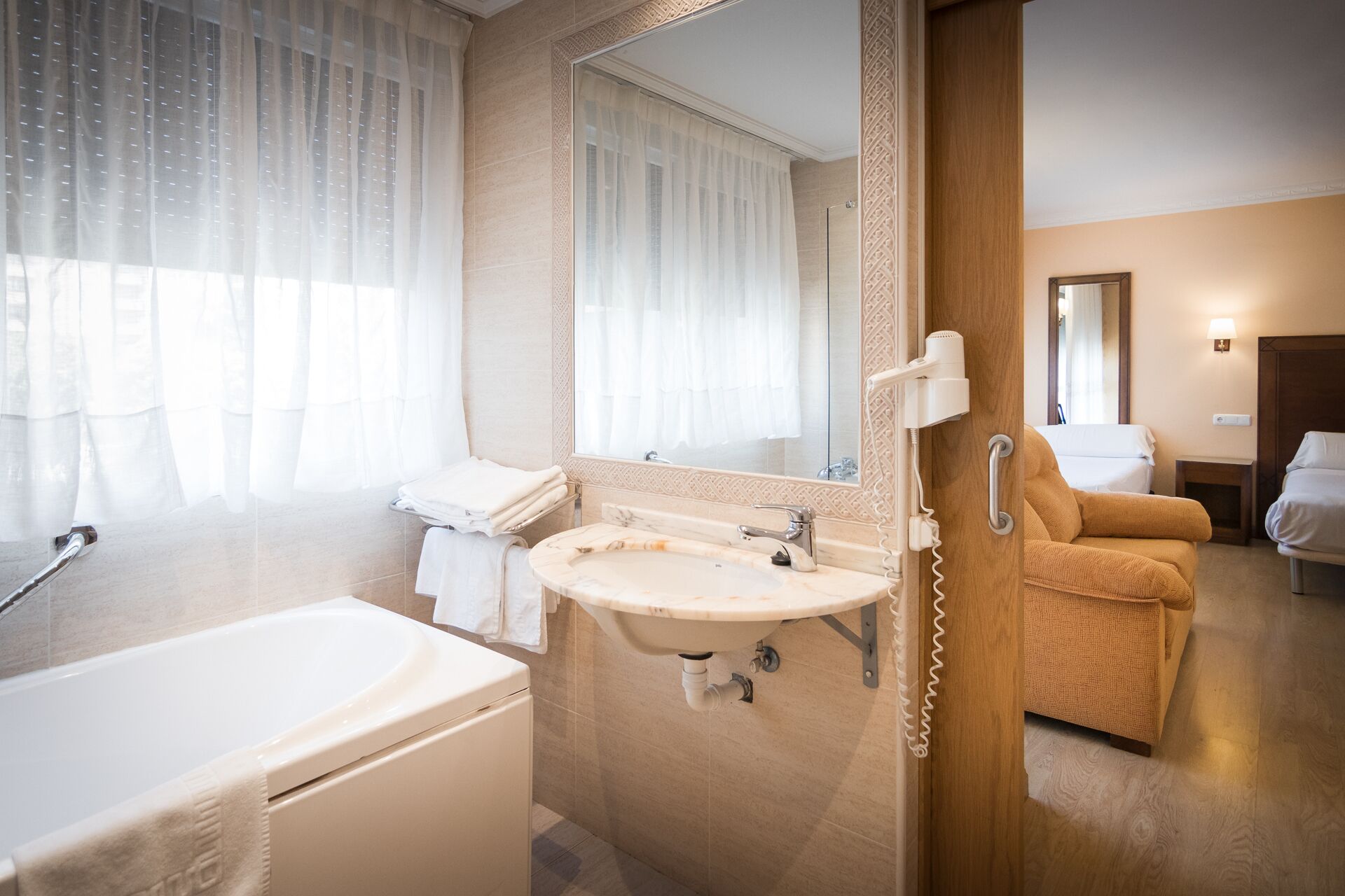 superior triple room | bathroom | shower, hydromassage showerhead, hair dryer, towels