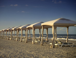 On the beach, beach cabanas, surfing, kayaking