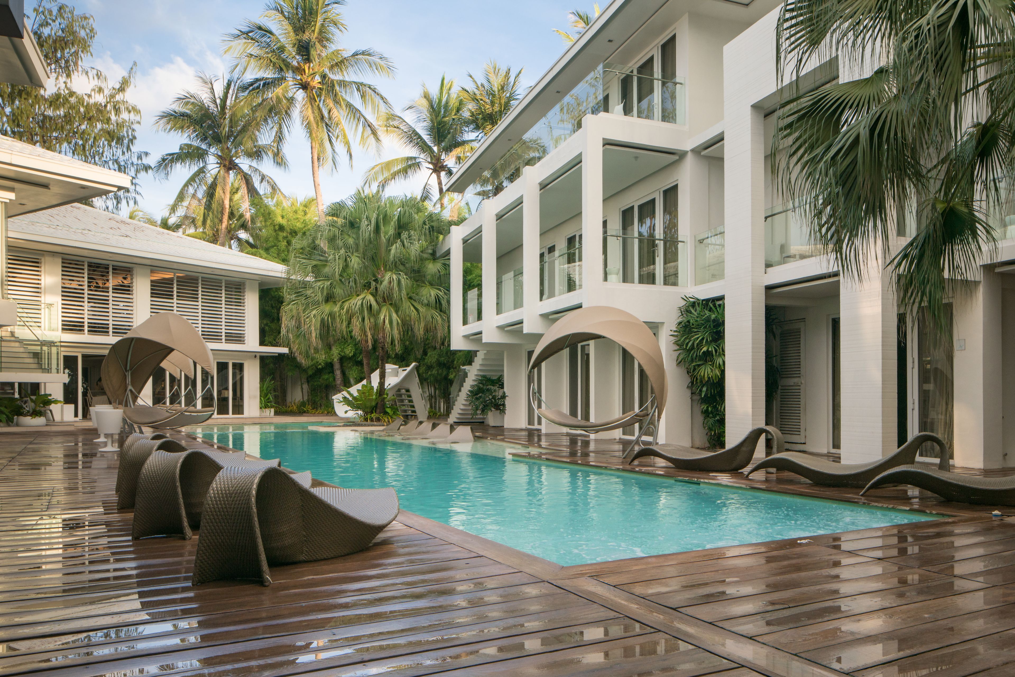 outdoor pool, open 8:00 am to 9:00 pm, pool umbrellas, pool loungers