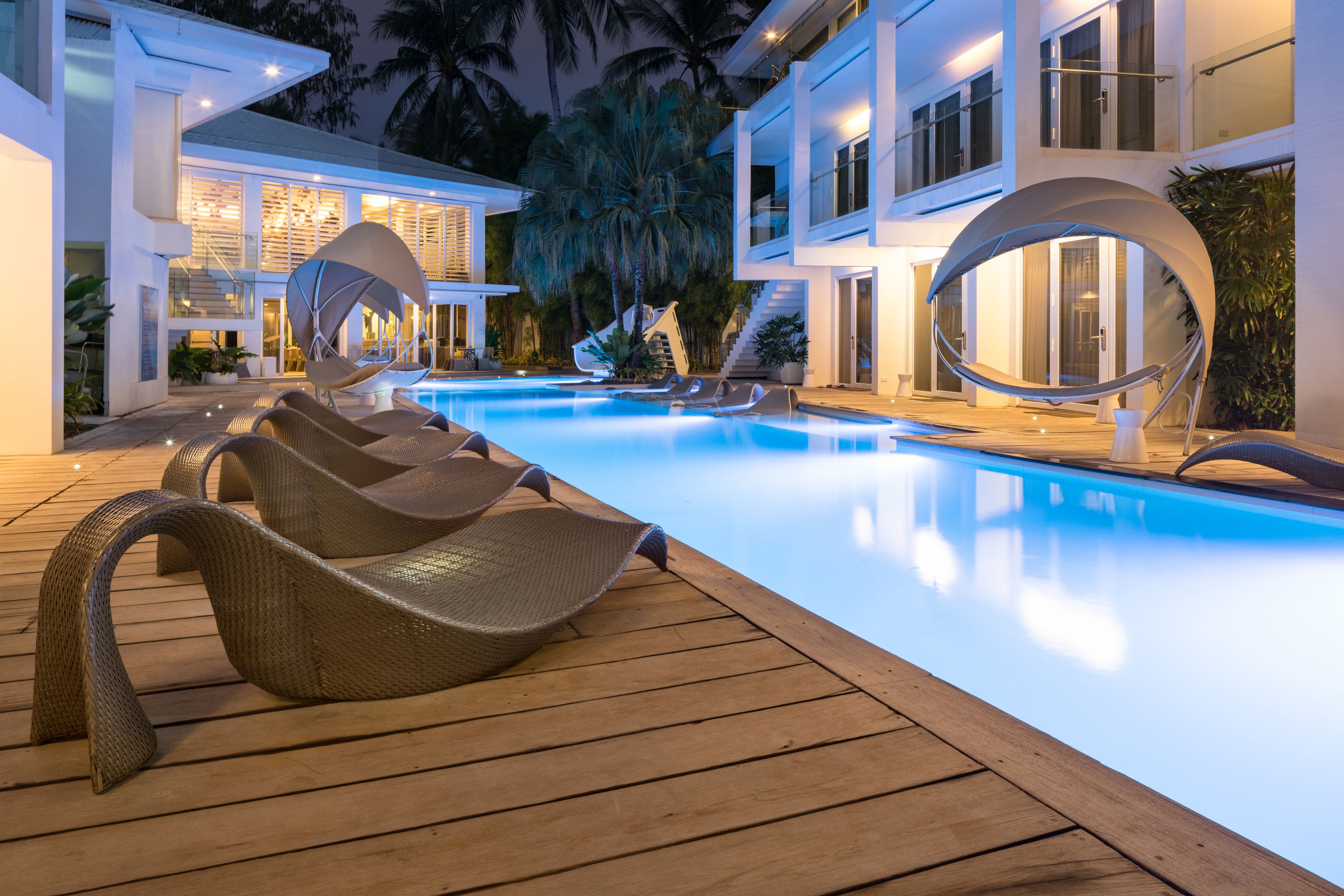 outdoor pool, open 8:00 am to 9:00 pm, pool umbrellas, pool loungers