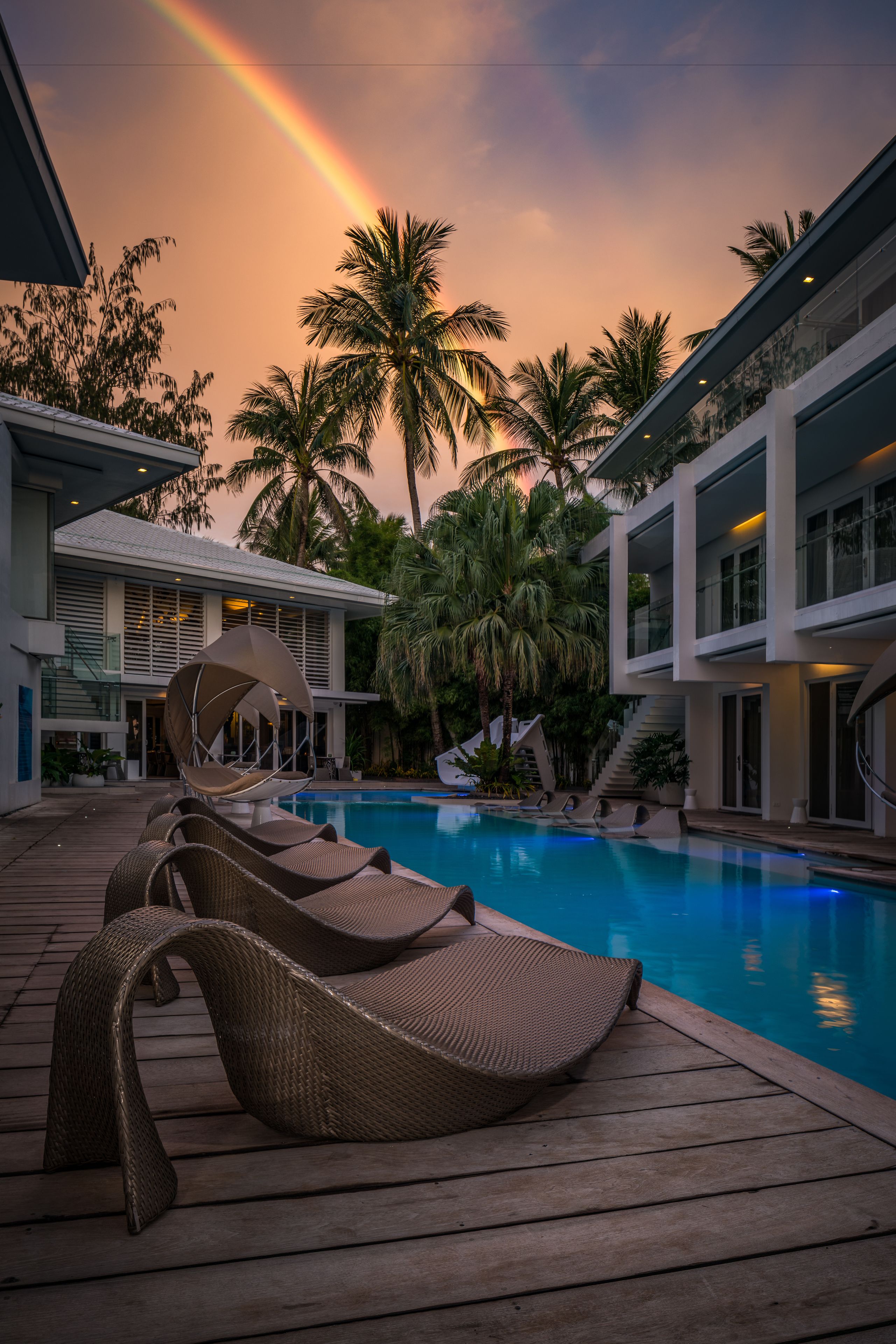 outdoor pool, open 8:00 am to 9:00 pm, pool umbrellas, pool loungers