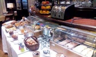 Daily buffet breakfast (EUR 18 per person)