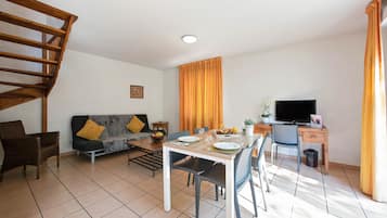 Apartment, 2 Bedrooms | Living area | Flat-screen TV