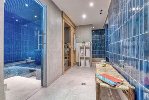 Sauna seca, sauna a vapor