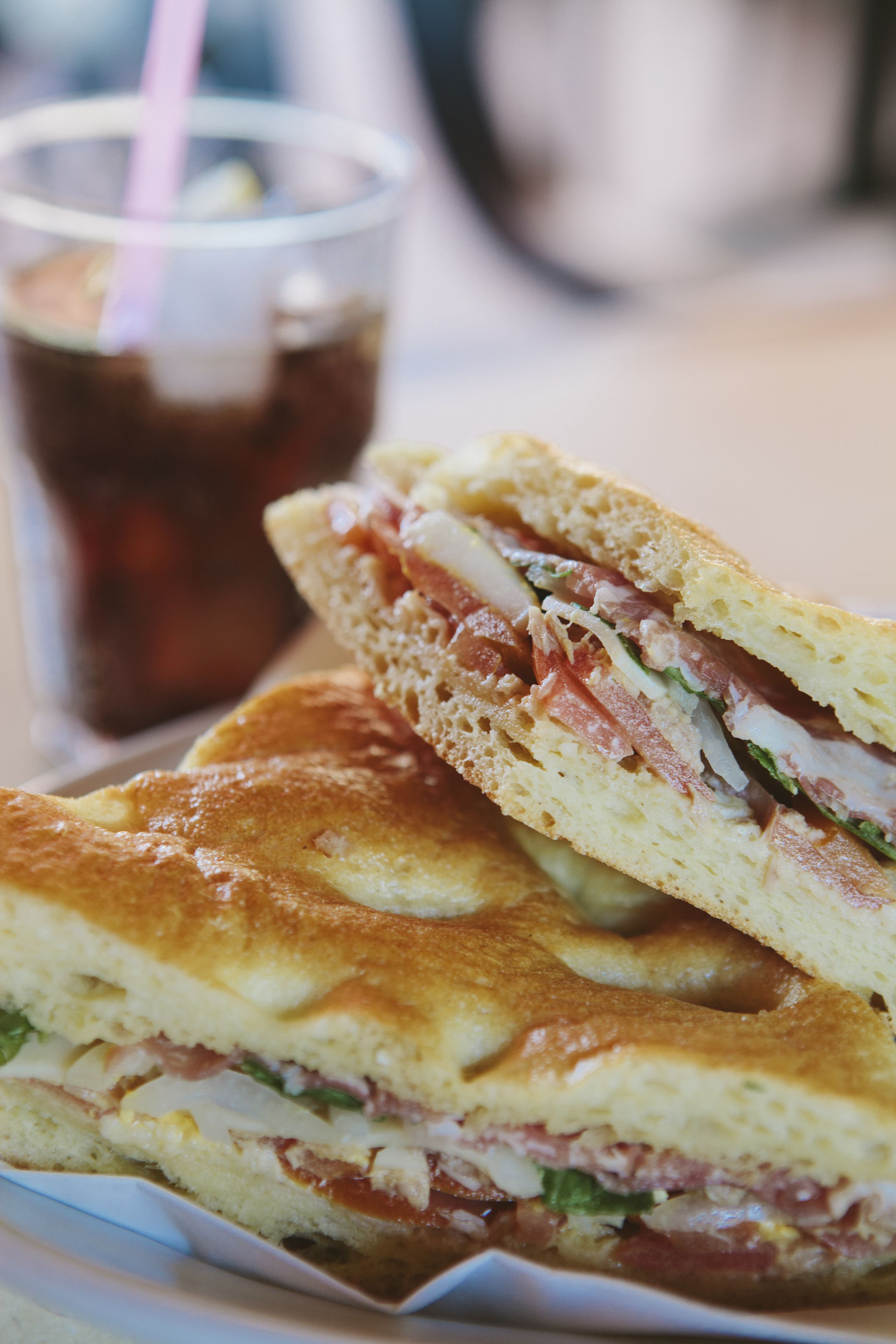 A sandwich with visible layers of ingredients.