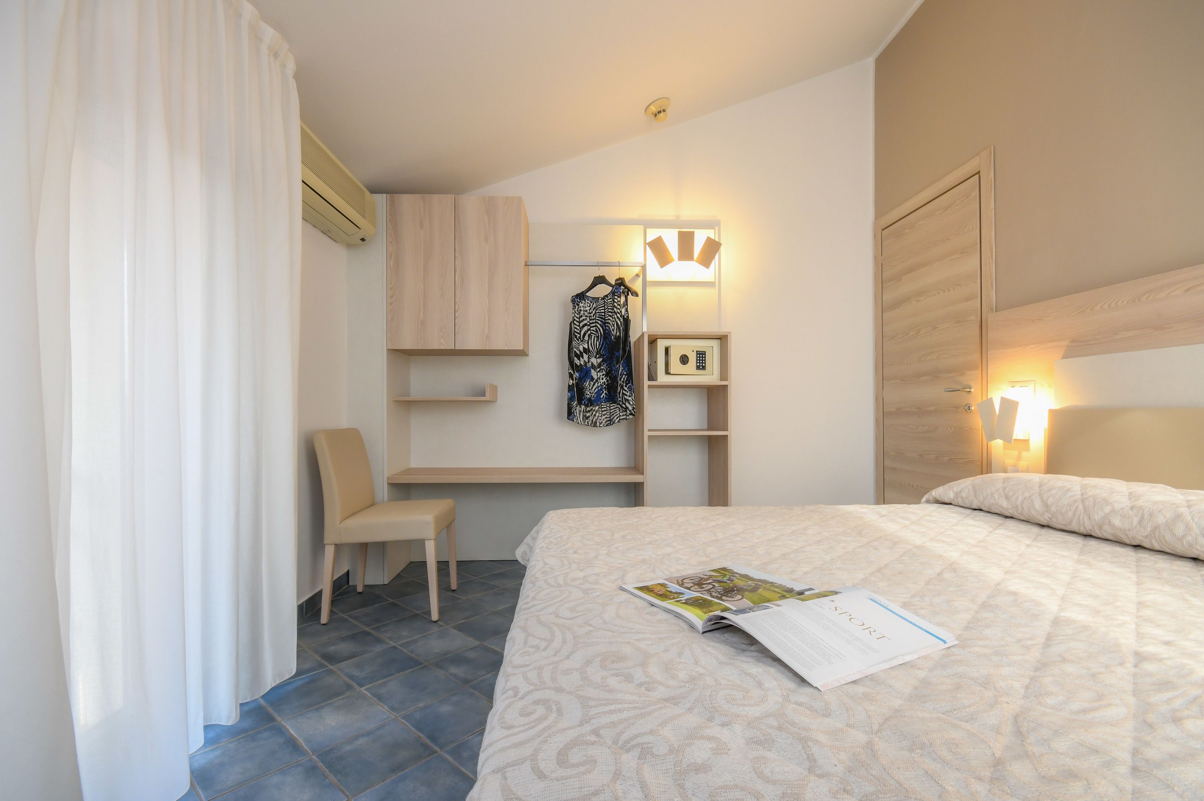 room, multiple beds | down duvets, in-room safe, desk, blackout curtains