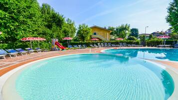 Seasonal outdoor pool, open 8:00 AM to 8:00 PM, pool umbrellas