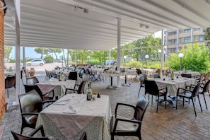 Breakfast, lunch, dinner served; Italian cuisine, al fresco dining