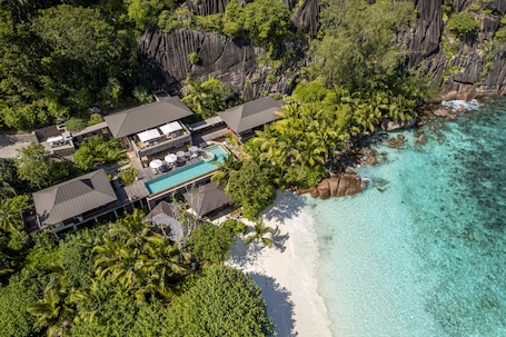 Suite, 3 Bedrooms (Beach) | Premium bedding, minibar, in-room safe, desk. Four Seasons Resort Seychelles