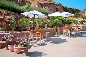 Breakfast, lunch, dinner served; local cuisine, garden views 