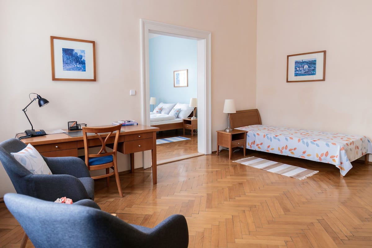 Junior Suite, 2 Bedrooms, Kitchen, City View | Living area | TV