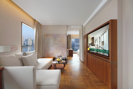 Shanghai Suite with River View | Egyptian cotton sheets, hypo-allergenic bedding, down comforters. Maxx by Steigenberger on the Bund