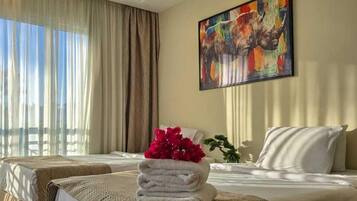 Deluxe Double or Twin Room, Garden View | Free minibar items, in-room safe, blackout curtains, iron/ironing board