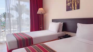 Free minibar items, in-room safe, blackout curtains, iron/ironing board