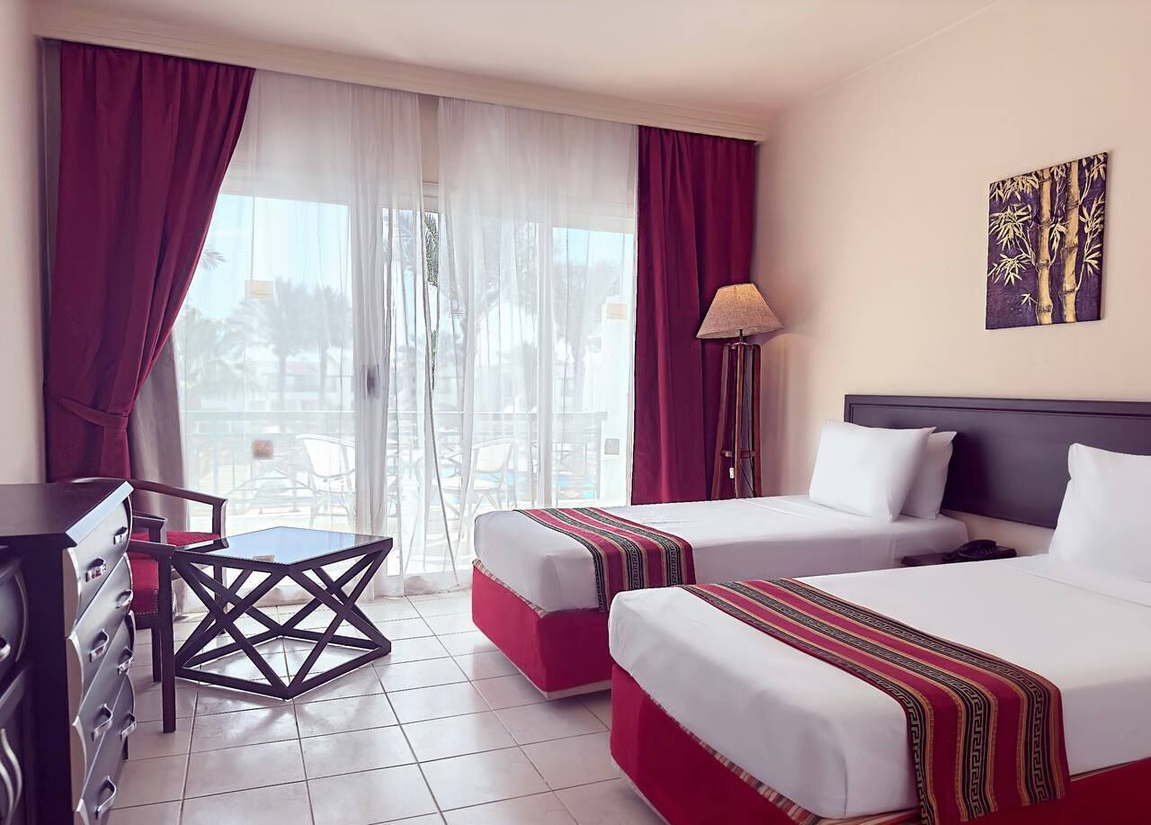 Standard Double or Twin Room, Garden View | Free minibar items, in-room safe, blackout curtains