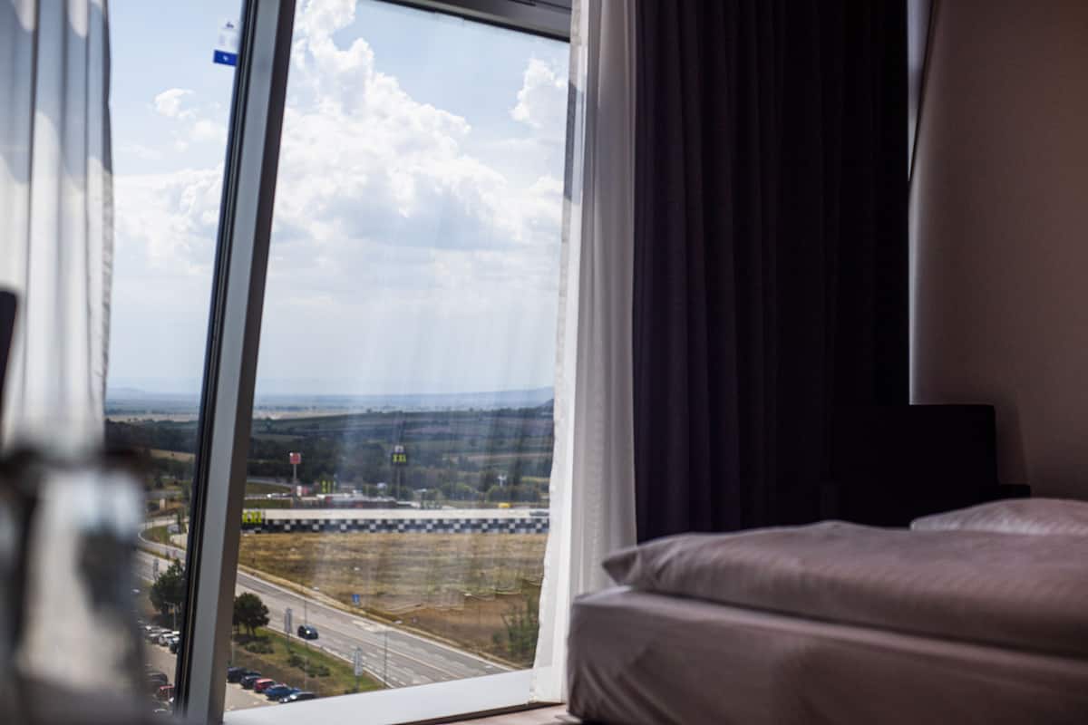 panoramic double room, 1 queen bed, non smoking, lake view (tower) | hypo-allergenic bedding, in-room safe, desk, laptop workspace