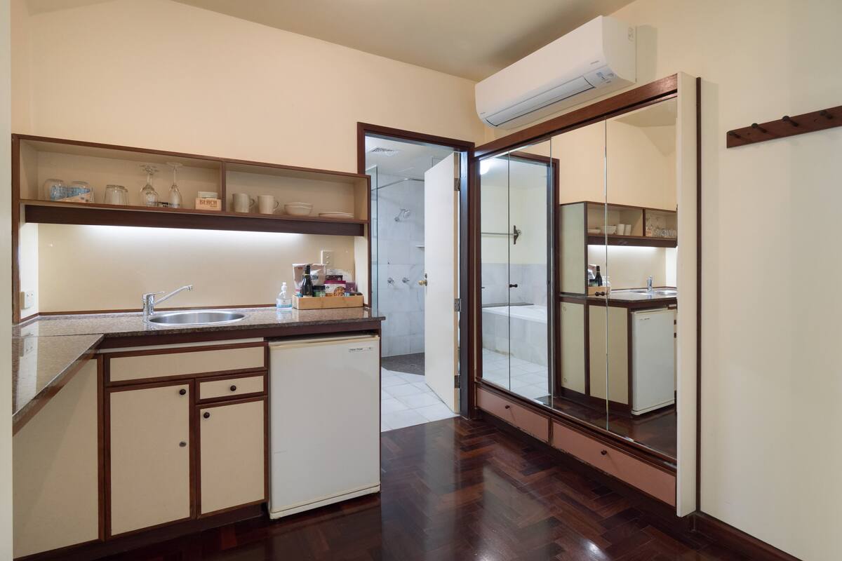 mini-fridge, electric kettle, toaster