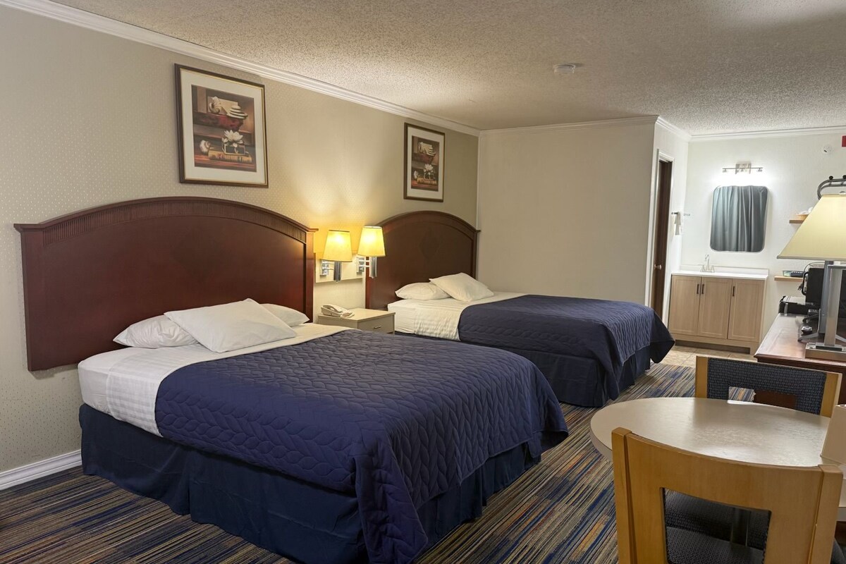 Deluxe Room, 2 Queen Beds, Non Smoking | Soundproofing, iron/ironing board, WiFi (free), alarm clocks
