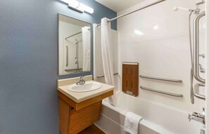 Combined shower/tub, hair dryer, towels, soap